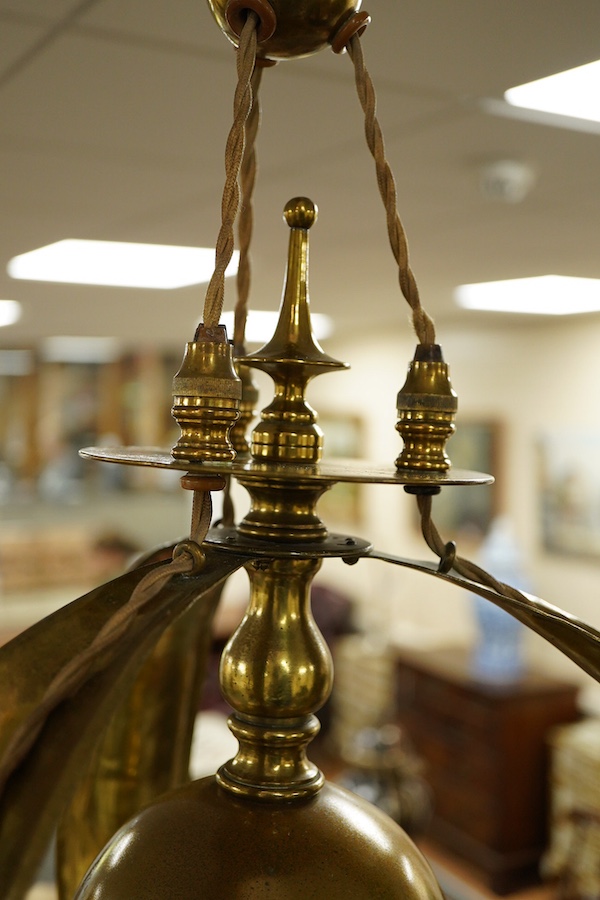 A late 19th century decorative brass, three branch hanging light, with fluted glass shades, 63cm high